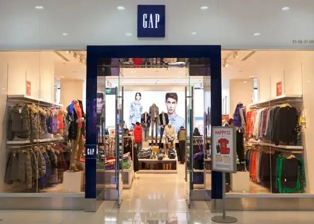 Gap store entrance and clothing displays with a headline about tracing shipment records